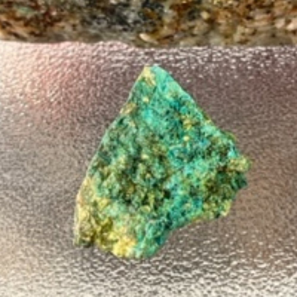 A Raw Turquoise / Chrysocolla stone hand minded in Tucson with layered shades